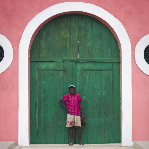 Boy With Cap In Front A Green Door, Benguela, Angola
