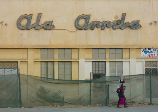 Woman Passing By A Shop With Her Baby On Her Back, Lobito, Angola