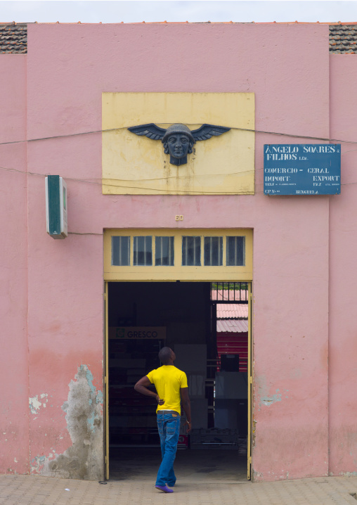 Man Entering The Trade Office In Benguela, Angola