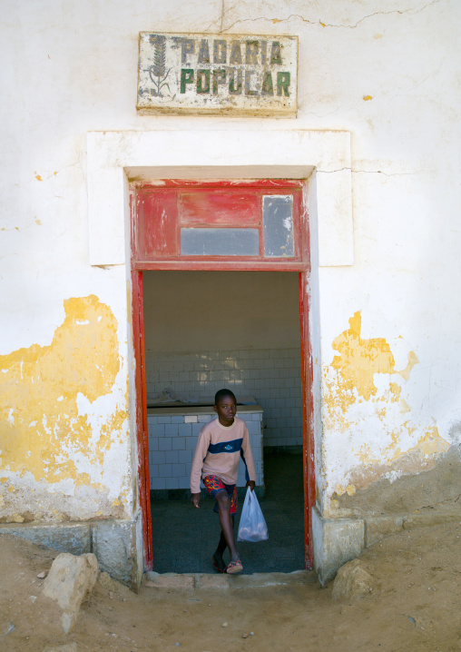 Boy Getting Out Of A Bakery, Namibe Town, Angola