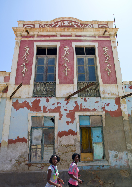 Girls In Front Of An Old Dilapidated Building In Namibe Town, Angola