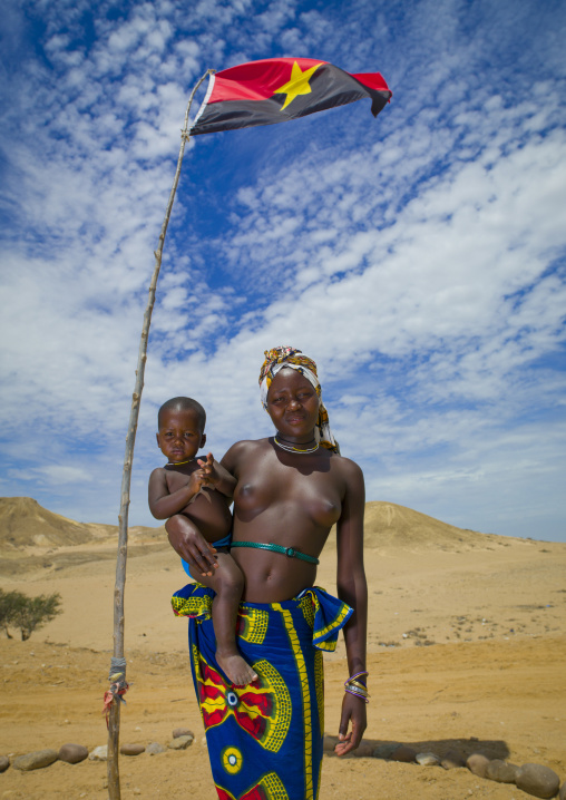 Mucuroca Woman With Her Baby Under The Angolan Flag, Twe Villge, Sao Joao Do Sul Area, Angola