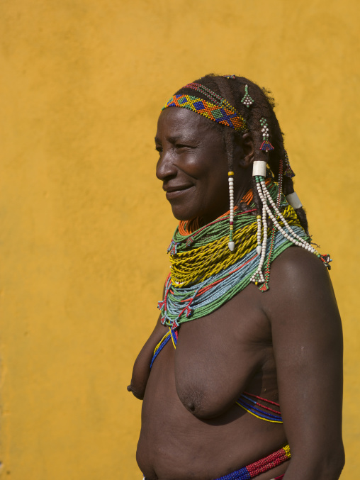 Old Mwila Woman With Vilanda Necklace And Traditional Hairstyle, Angola