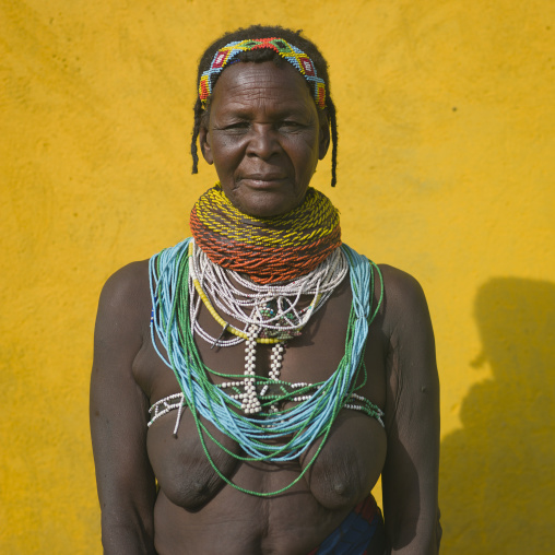 Old Mwila Woman With Vilanda Necklace At Huila Town Market, Angola