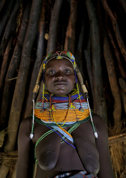 Mwila Woman Inside Her Hut, Angola