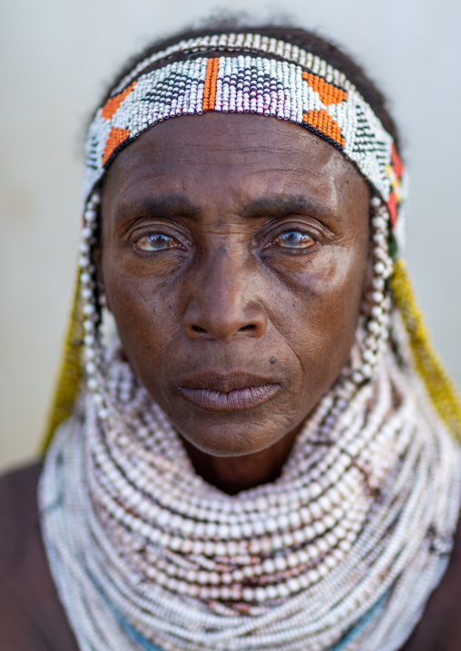 Handa tribe woman with huge beaded necklaces, Huila Province, Hoque, Angola