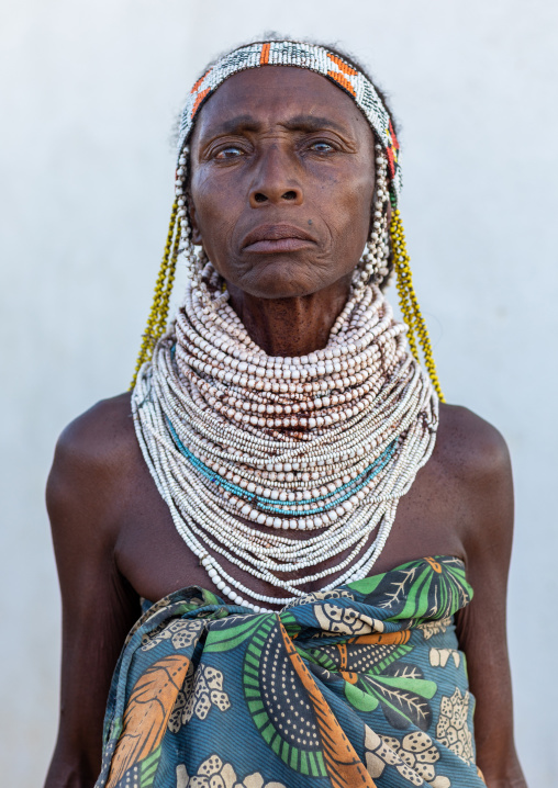 Handa tribe woman with huge beaded necklaces, Huila Province, Hoque, Angola