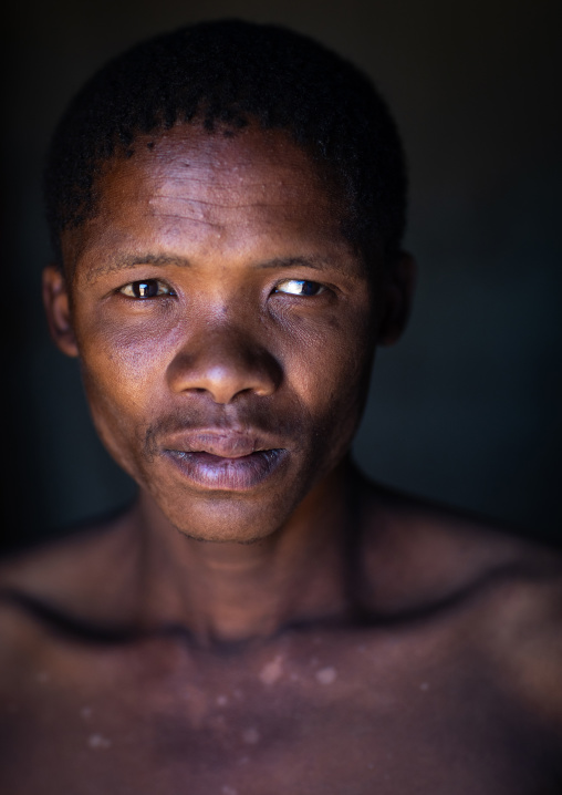 San tribe man portrait, Huila Province, Chibia, Angola