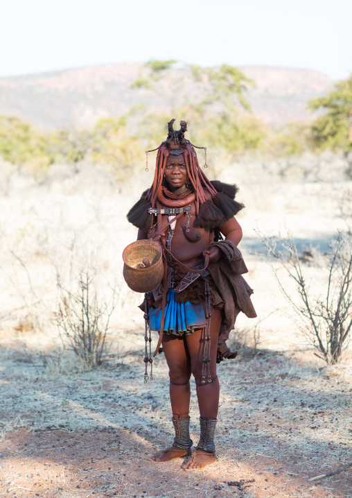 Himba tribe woman in the bush, Cunene Province, Oncocua, Angola