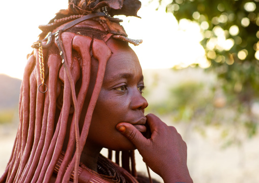 Thoughtful himba tribe woman, Cunene Province, Oncocua, Angola