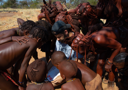 Batwa tribe children looking the camera of a tourist, Cunene Province, Oncocua, Angola