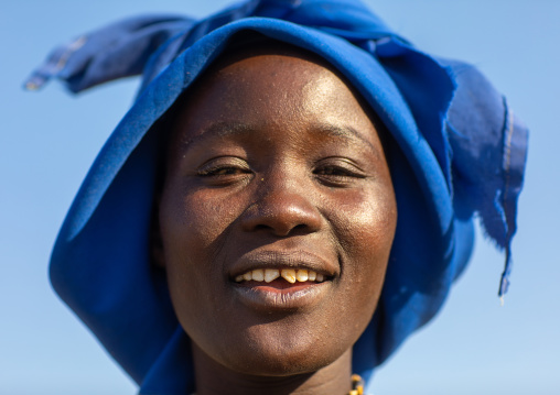 Smiling mucubal tribe woman with sharpened teeth, Namibe Province, Virei, Angola