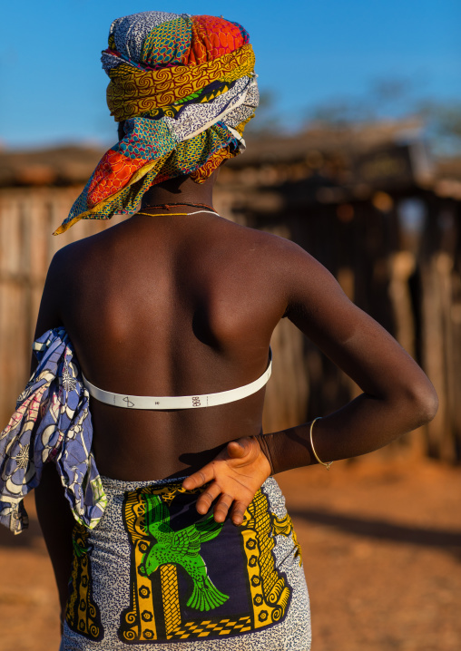 Rear view of a Nguendelengo tribe woman, Namibe Province, Capangombe, Angola