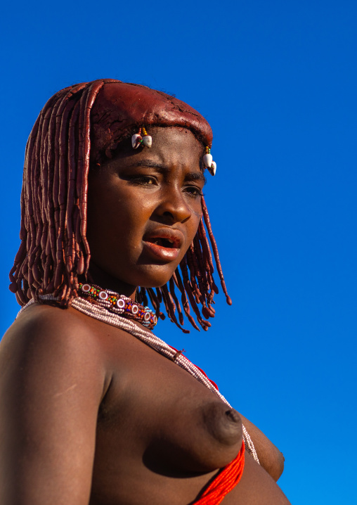 Portrait of a topless mumuhuila tribe woman, Huila Province, Lubango, Angola