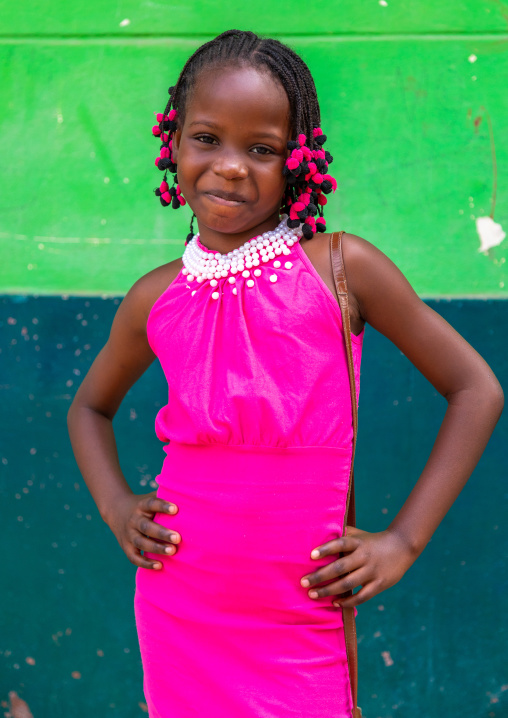 Cute angolan girl dressed in pink for sunday, Benguela Province, Catumbela, Angola