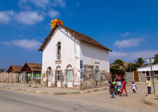 Children walking in front of an old portuguese colonial house, Benguela Province, Catumbela, Angola