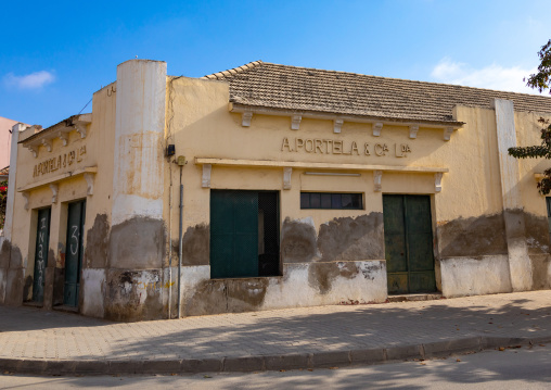 Old portuguese colonial building hosting a shop, Benguela Province, Benguela, Angola