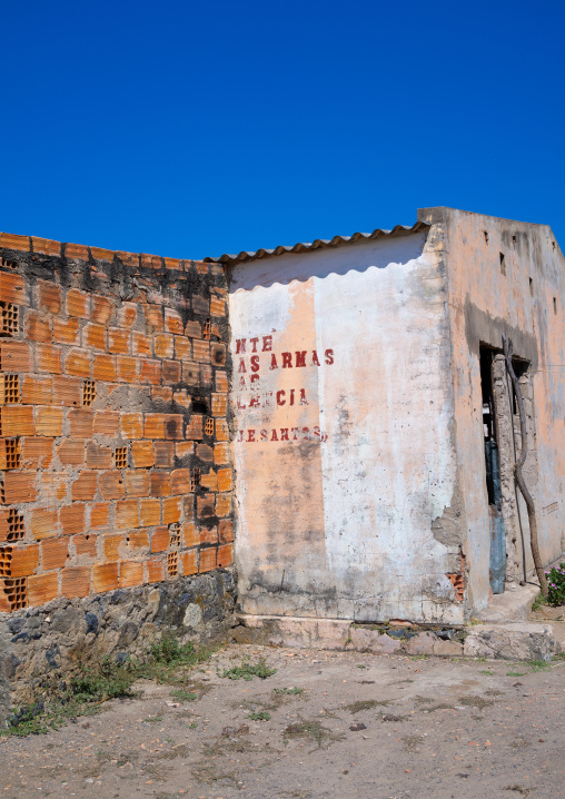 Old communist propaganda message written on a wall, Cunene Province, Cahama, Angola