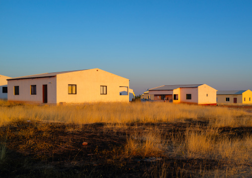 Popular and middle class new houses in the bush, Cunene Province, Oncocua, Angola