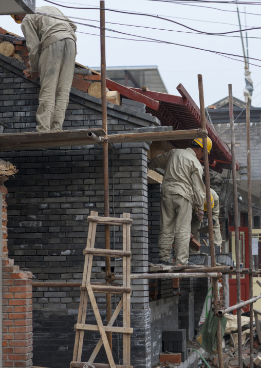 Manual Workers On A Contruction Site In A Hutong, Beijing, China