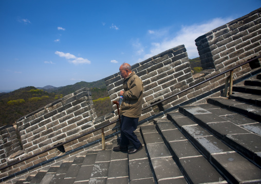 Old Man Going Down The Great Wall, Beijing, China