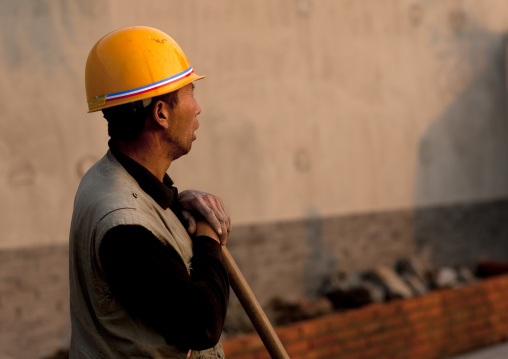Manual Worker On A Contruction Site, Beijing, China
