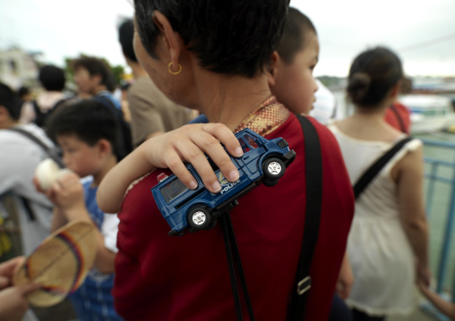 Kid Holding A Poilce Car Toy, Hong Kong, China