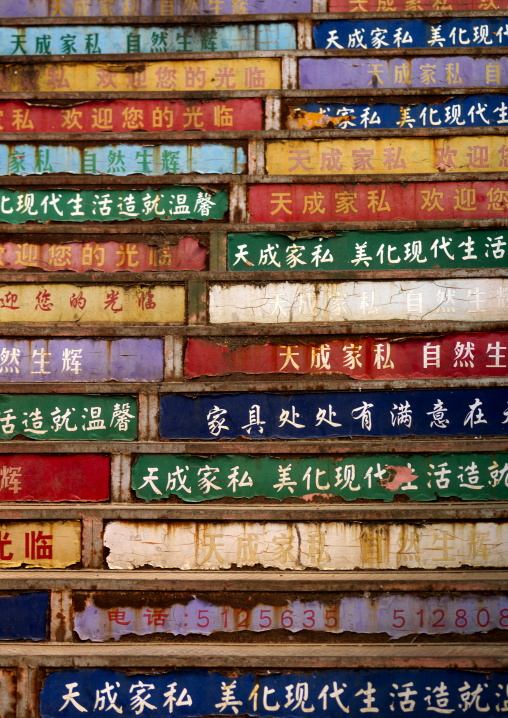 Advertising On Stairs In Menglun Market, Yunnan Province, China