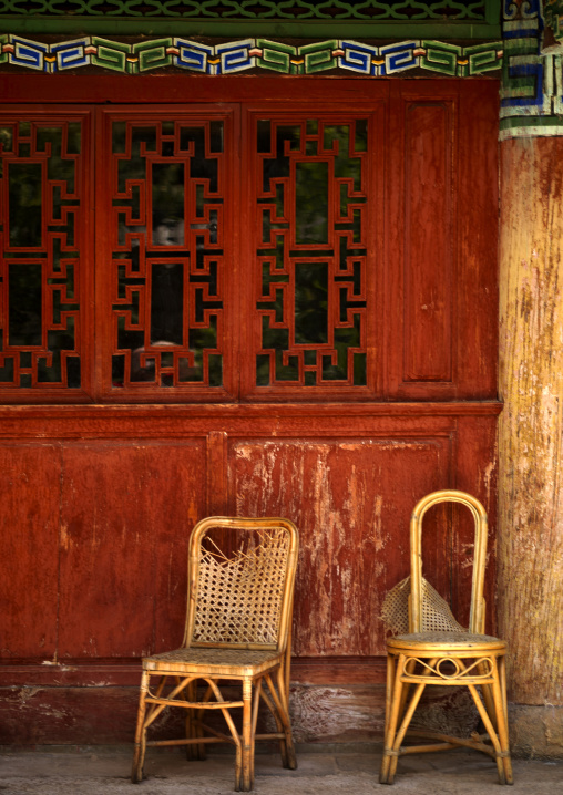 Chairs In Front Of An Old House, Lijiang, Yunnan Province, China