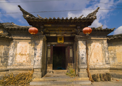 Old Chinese traditional gate With Lanterns In Tuan Shan Village, Jianshui, Yunnan Province, China