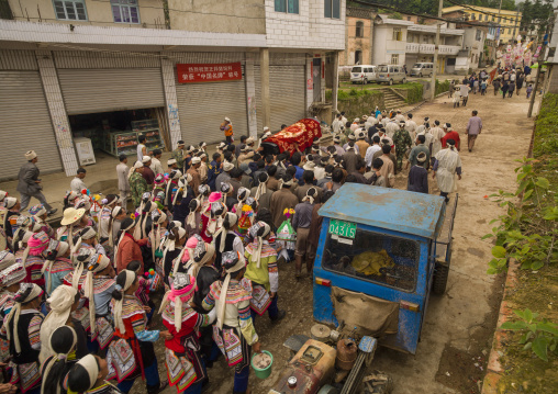 Funeral Procession In The Street, Yuanyang, Yunnan Province, China