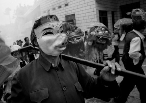 Man With A Pig Mask During A Funeral Procession, Yuanyang, Yunnan Province, China