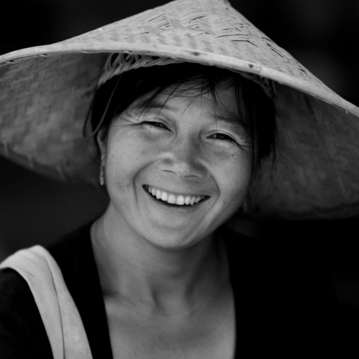 Young Woman With A Chinese Hat, Menglun, Yunnan Province, China