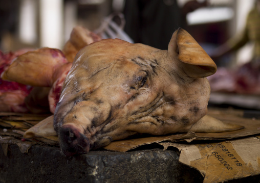 Pork Head In A Local Market, Lijiang, Yunnan Province, China