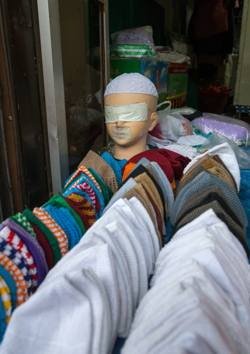 Muslim caps for sale in a shop, Qinghai province, Xining, China