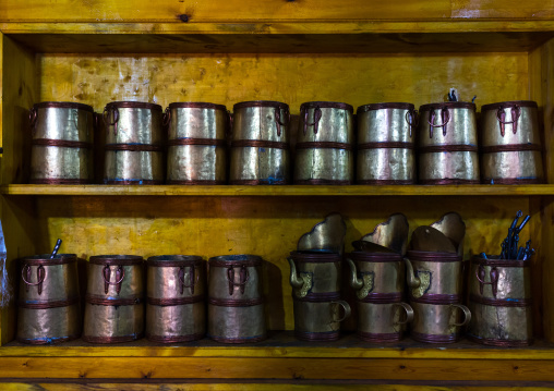Metal pots inside the monks kitchen in Rongwo monastery, Tongren County, Longwu, China