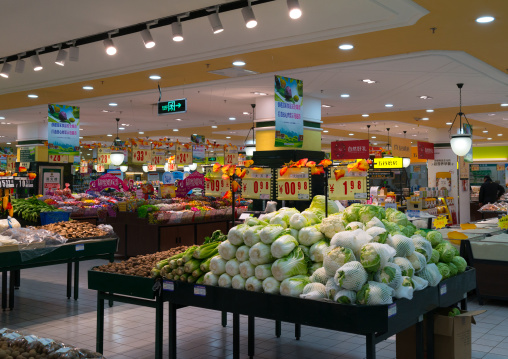 Vegetables and fruits section of supermarket, Gansu province, Linxia, China