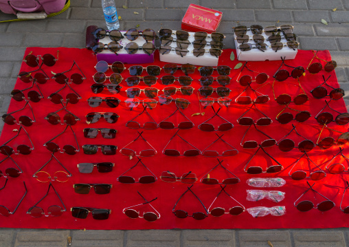 Sunglasses for sale in the street, Gansu province, Linxia, China