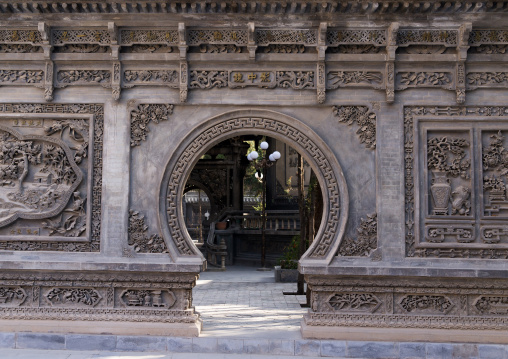 Yu Baba Gongbei chinese  style gate in the mosque garden, Gansu province, Linxia, China