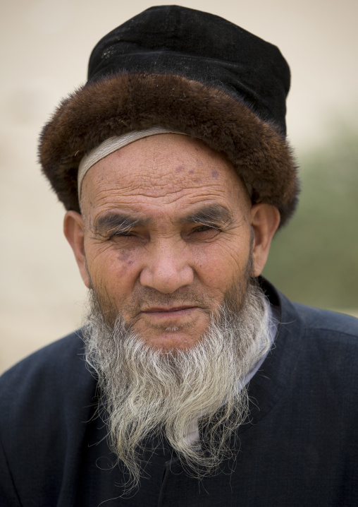 Uyghur Sufi Man At Imam Asim Tomb In The Taklamakan Desert, Xinjiang Uyghur Autonomous Region, China