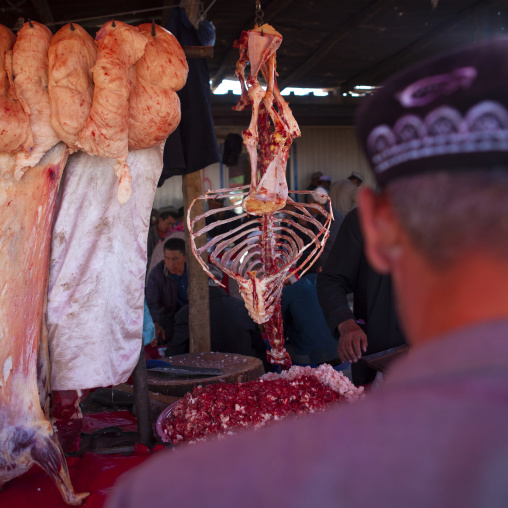 Butcher In Kashgar Animal Market, Xinjiang Uyghur Autonomous Region, China
