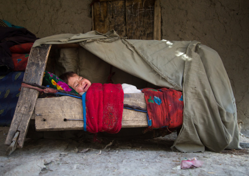 Baby sleeping in a craddle, Badakhshan province, Qazi deh, Afghanistan