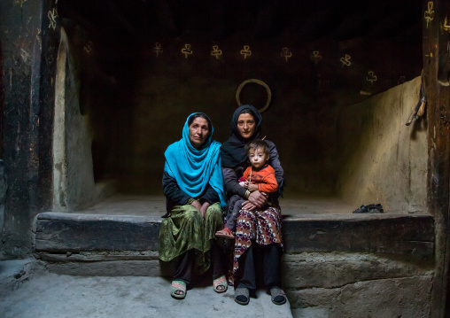 Afghan family inside their traditional pamiri house, Badakhshan province, Zebak, Afghanistan