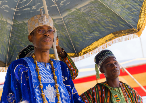 Benin, West Africa, Porto-Novo, king gbèmédô tognon zounon walking under an umbrella