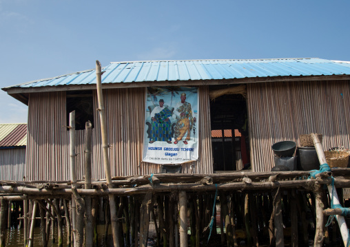 Benin, West Africa, Ganvié, death annoucement on the wall of a stilt house on lake nokoue