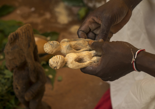 Benin, West Africa, Bonhicon, kagbanon bebe voodoo priest blessing statues during a ceremony