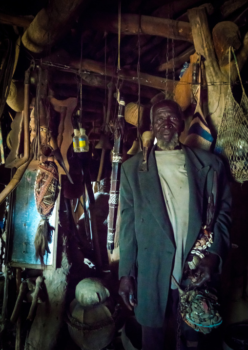 Benin, West Africa, Boukoumbé, mr kouagou maxon in his traditional tata somba house and his traditional medicine
