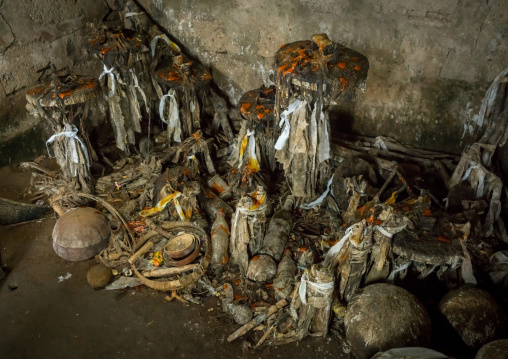 Benin, West Africa, Bopa, voodoo altars covered with oil and blood representing the former masters in a temple