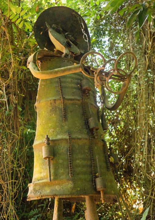 Benin, West Africa, Ouidah, ogun gof of war voodoo statue in the sacred forest of kpasse