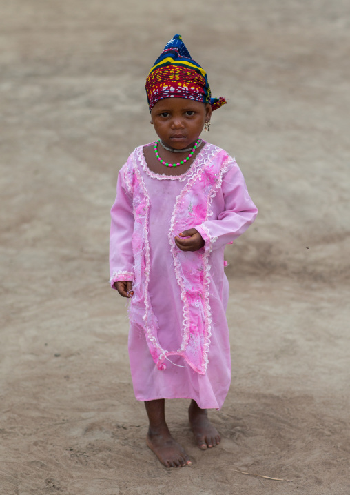 Benin, West Africa, Savalou, fulani peul tribe little girl in pink dress